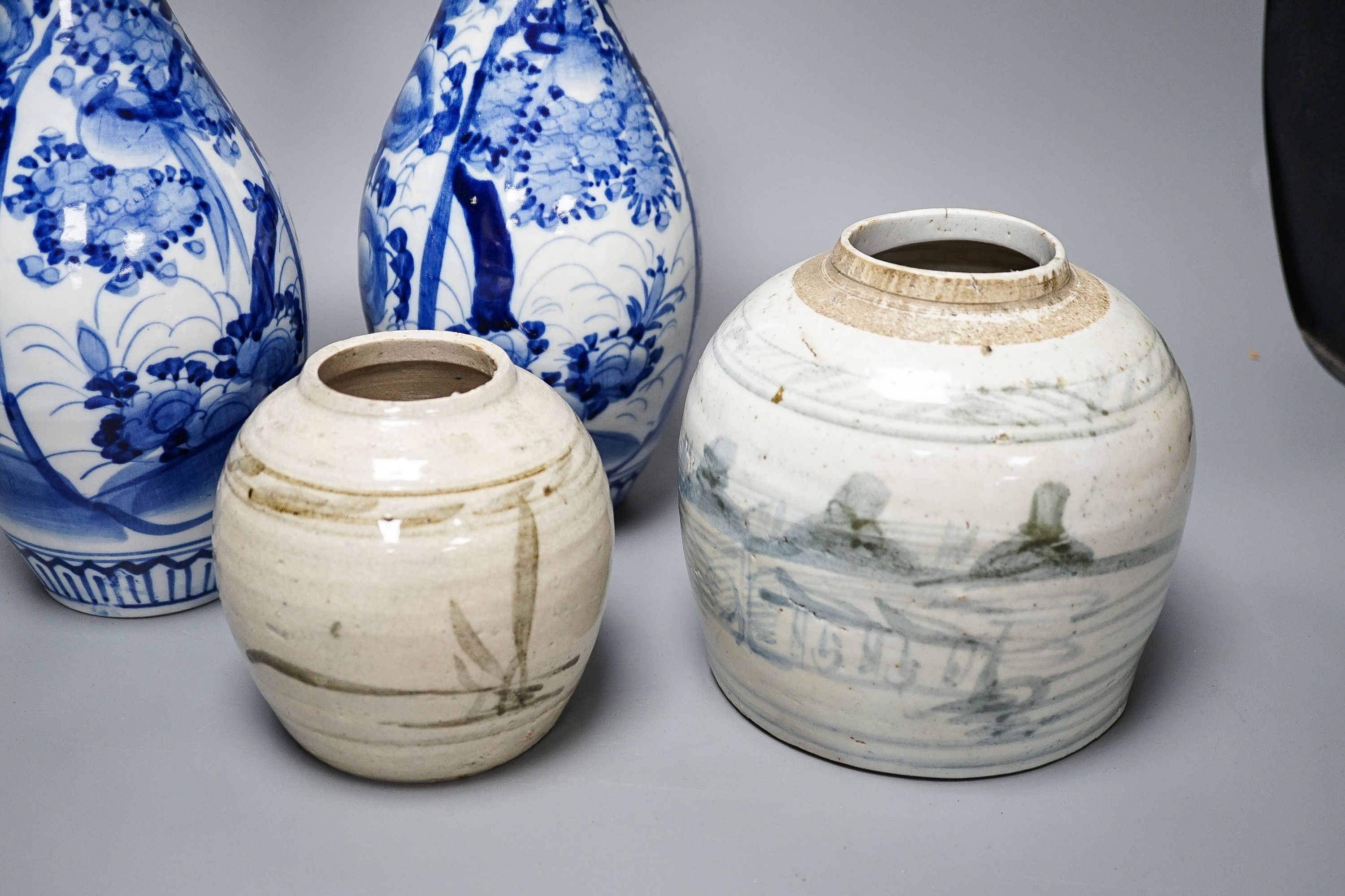 Two provincial Chinese blue and white jars and a pair of Japanese vases 32cm